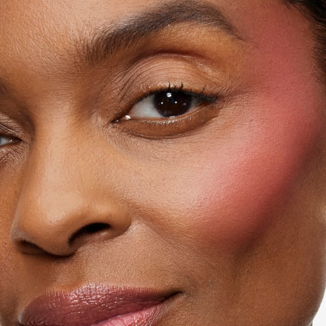 Blush applied on cheeks	