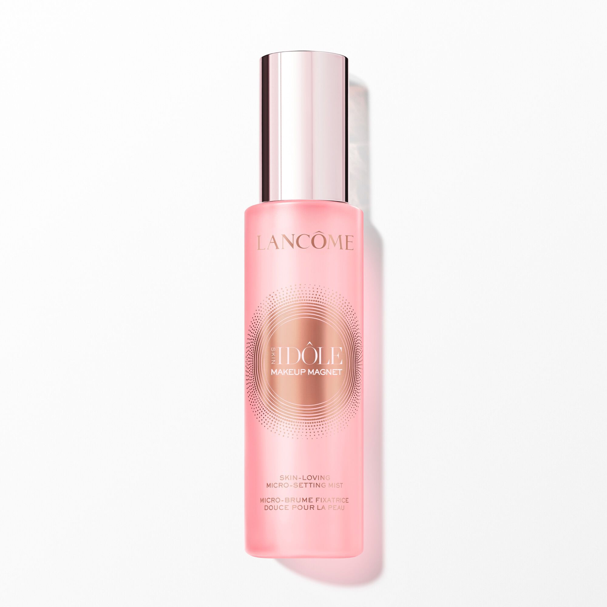 Pink bottle of Lancome Idole Makeup Magnet setting mist.