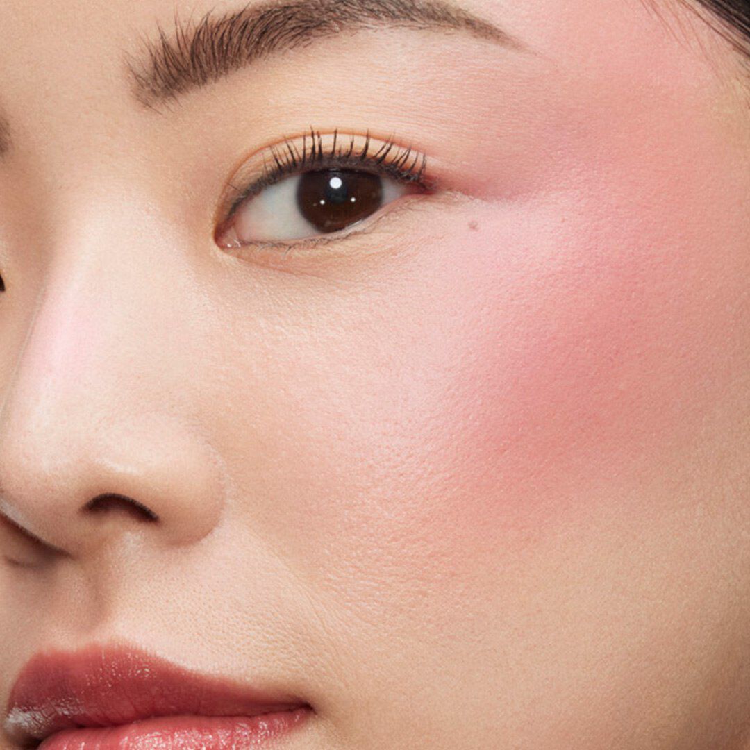 Blush applied on cheeks	